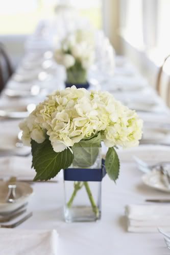 A centerpiece is a central piece in the middle of a wedding reception hall