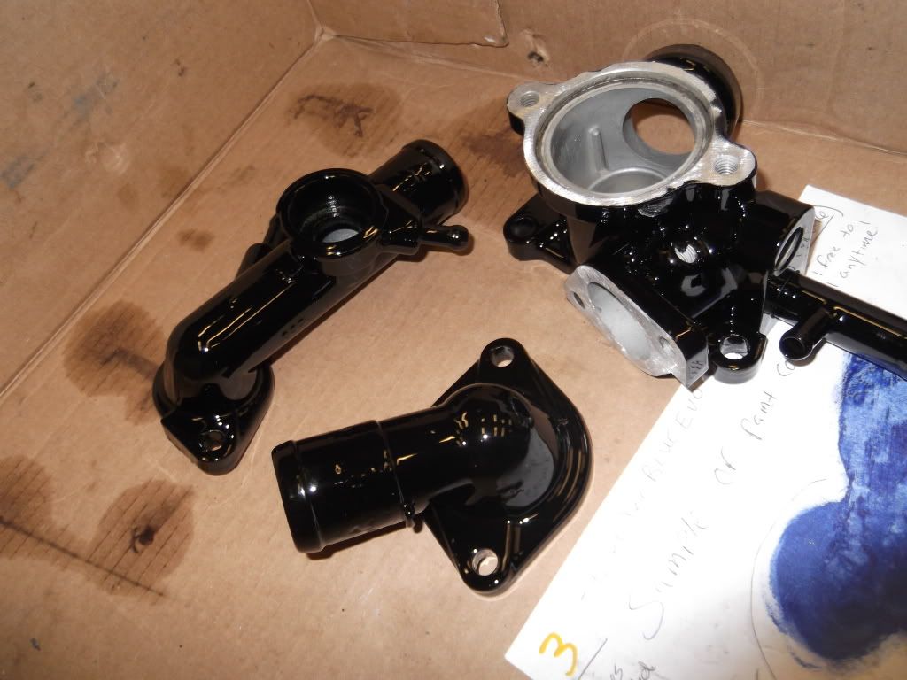 http://i1224.photobucket.com/albums/ee370/DetectiveCoating/SD%20Wet%20Black/DSCF0663.jpg