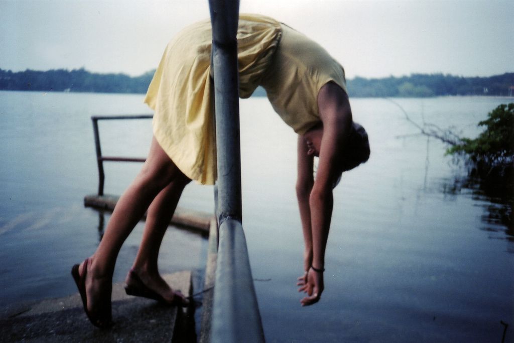 girl hanging upside down